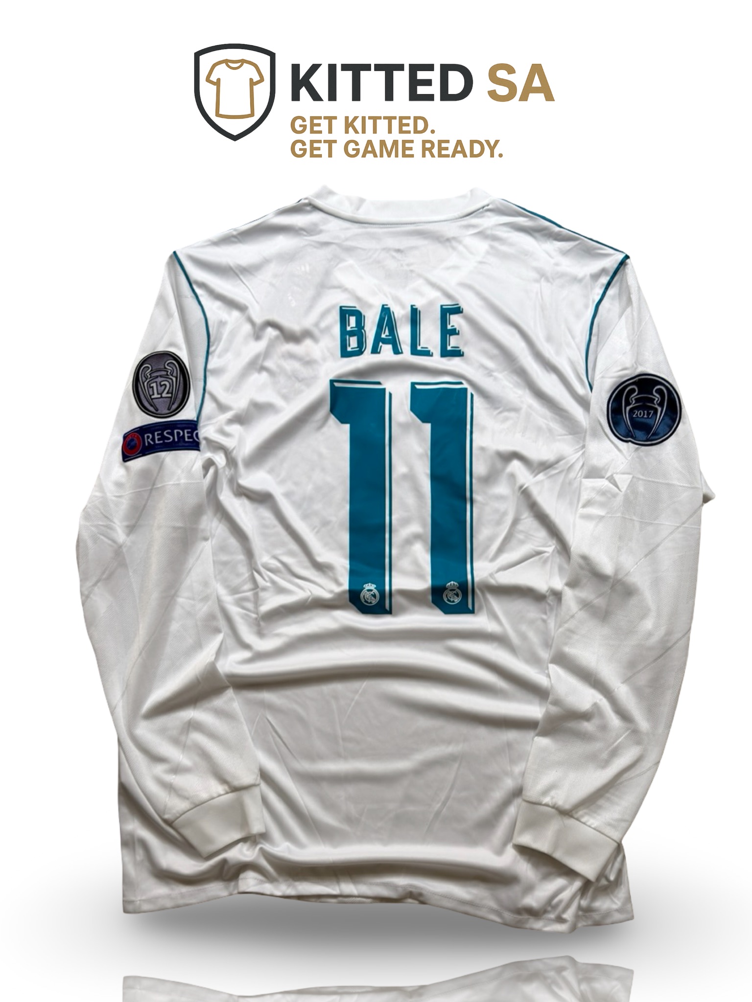 KITTED SA *Real Madrid 2018 Bale Final Long Sleeve Kit* Bale’s greatest Madrid moment. A long sleeve shirt from one of the most unforgettable final performances ever. Kyiv, history and a bicycle kick that became football legend. The 2018 Real Madrid final long sleeve shirt is forever linked to Gareth Bale’s incredible performance in Kyiv. Coming off the bench and scoring one of the greatest goals ever seen on the biggest European stage, Bale turned the match into a moment of pure football history. Featuring the clean white adidas design, Fly Emirates sponsor, long sleeve construction, final text detailing and Champions League badge detailing, this jersey represents the night Madrid secured a third straight European title in unforgettable style. * Official Real Madrid 2018 final design * Gareth Bale print * Long sleeve construction * Classic white Real Madrid colourway * Fly Emirates sponsor * adidas construction * Final text detailing * Champions League badge detailing * Kyiv 2018 final era * Modern football collector piece Bale brilliance. Madrid history. A long sleeve shirt built around one impossible goal.